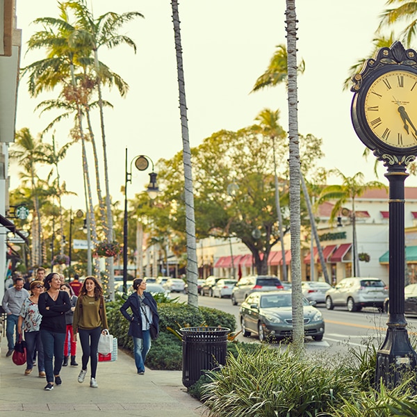 Naples Fl family walking downtown in the top ranked safest city in the United States