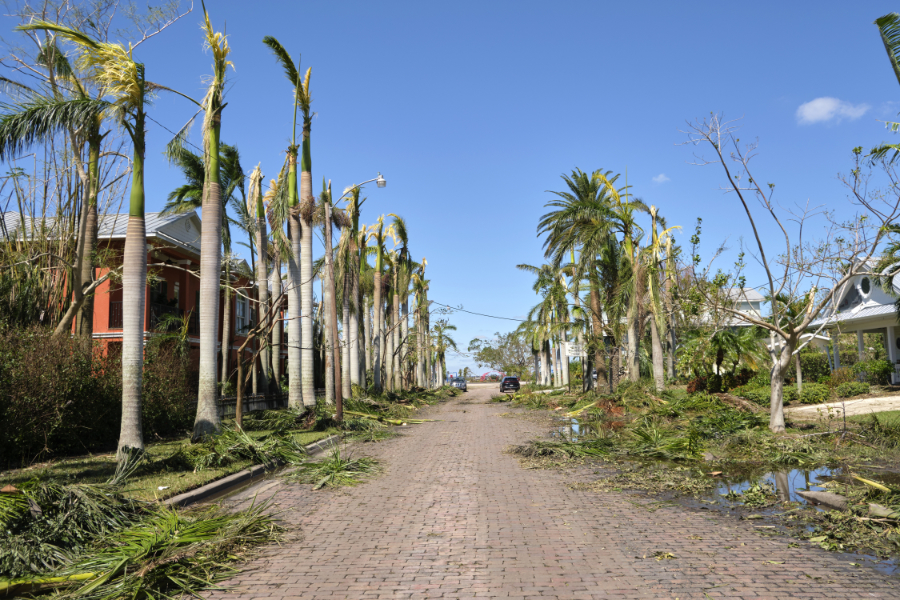 Town street with scattered debris after hurricane Ian in Florida