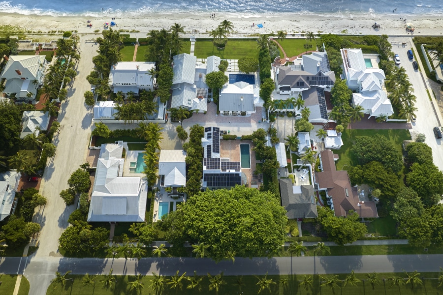 Aerial view of luxury homes in neighborhood near the beach