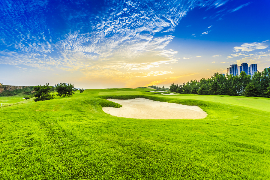 Beautiful golf landscape with blue sky that is a part of one of the premier golf courses