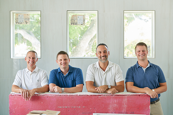 Drew, Adam, Andrew and Mike in their Naples Park investment home.
